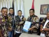 Kang Cucu Menerima SKEP PLT. Ketua PC 1020 GM FKPPI Purwakarta dari Ketua PD X GM FKPPI Jabar Agus Windu Hanggono